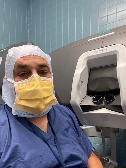 Dr. Alden with Vinci Robot